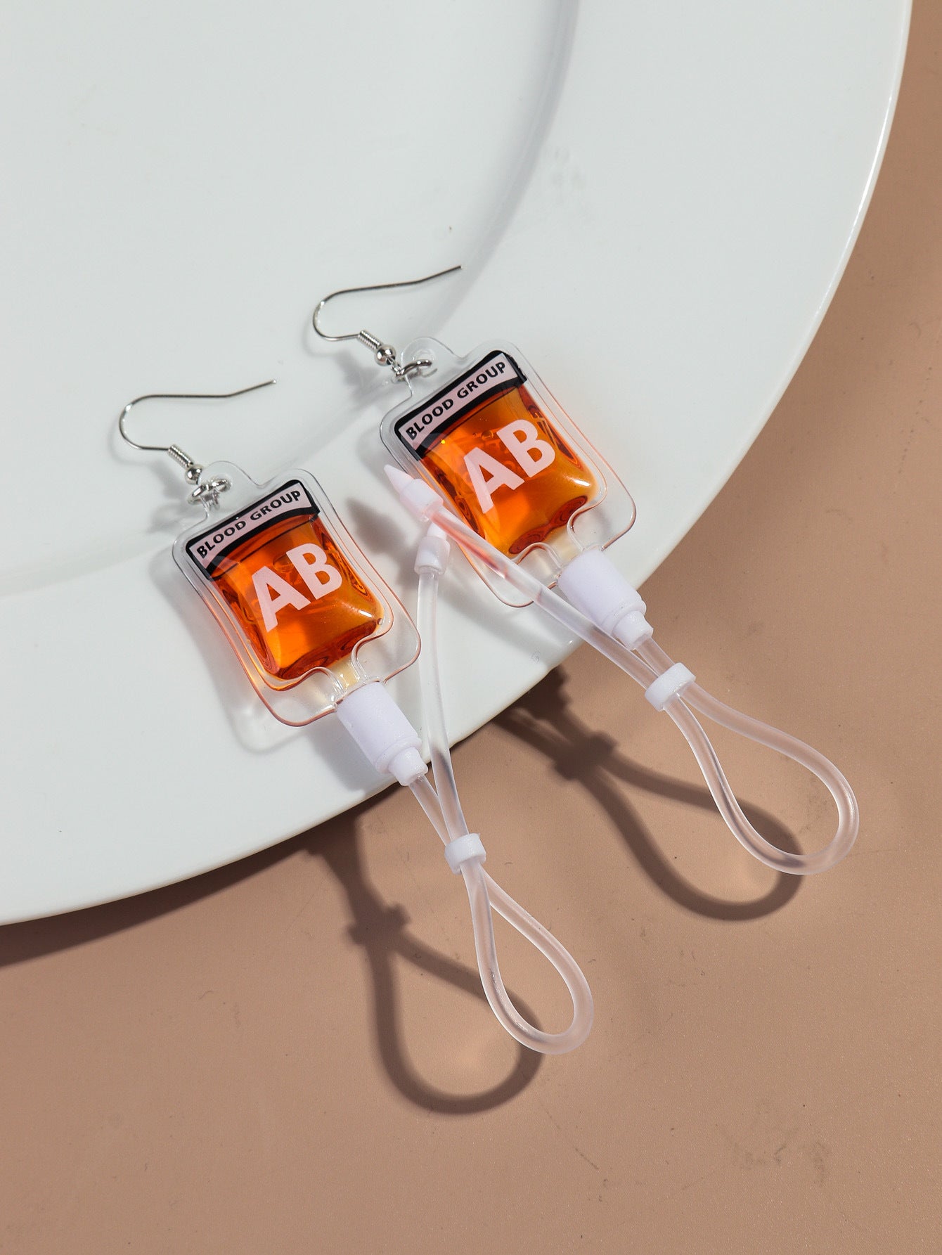 Wholesale creative plasma blood bag earrings