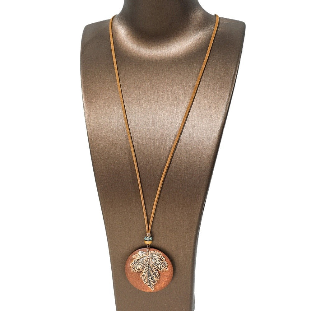 Wholesale Retro Bohemian Alloy Electroplated Jewelry Set Round Hollow Earrings Long Necklace Party Wear