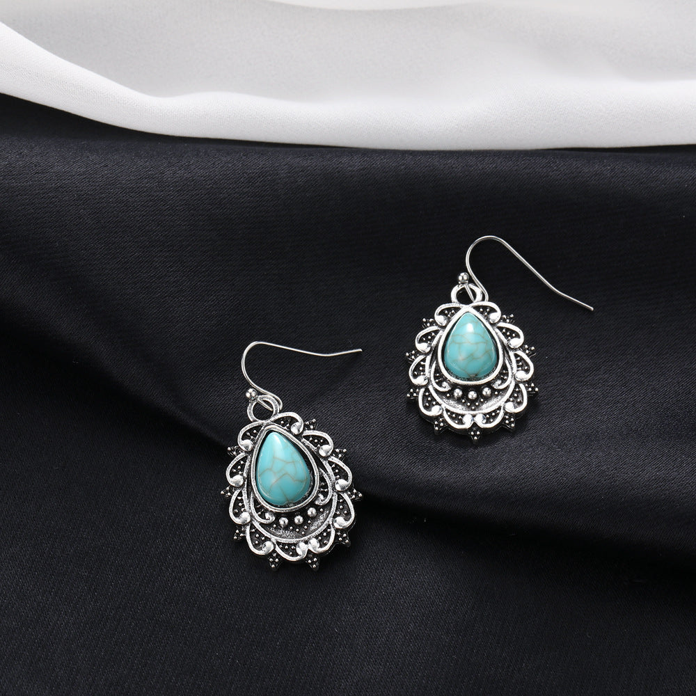 Wholesale Bohemian turquoise teardrop shaped carved earrings