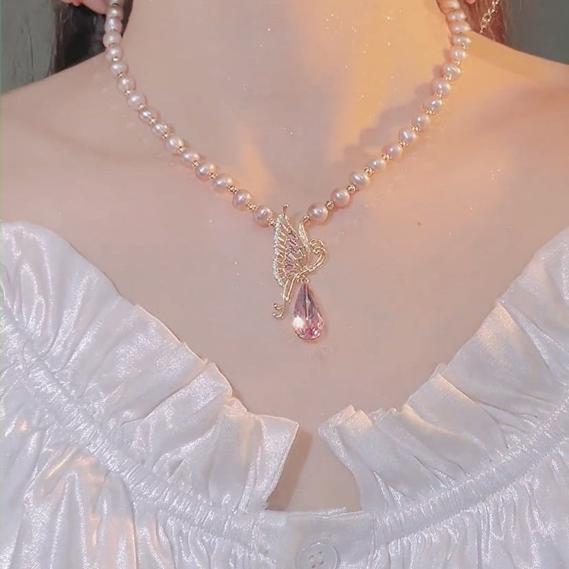 Wholesale Light luxury butterfly pearl sweater necklace