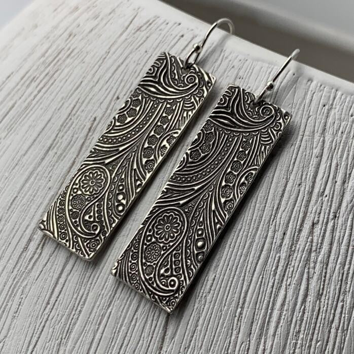 Wholesale Bohemian retro geometric carved flower alloy earrings