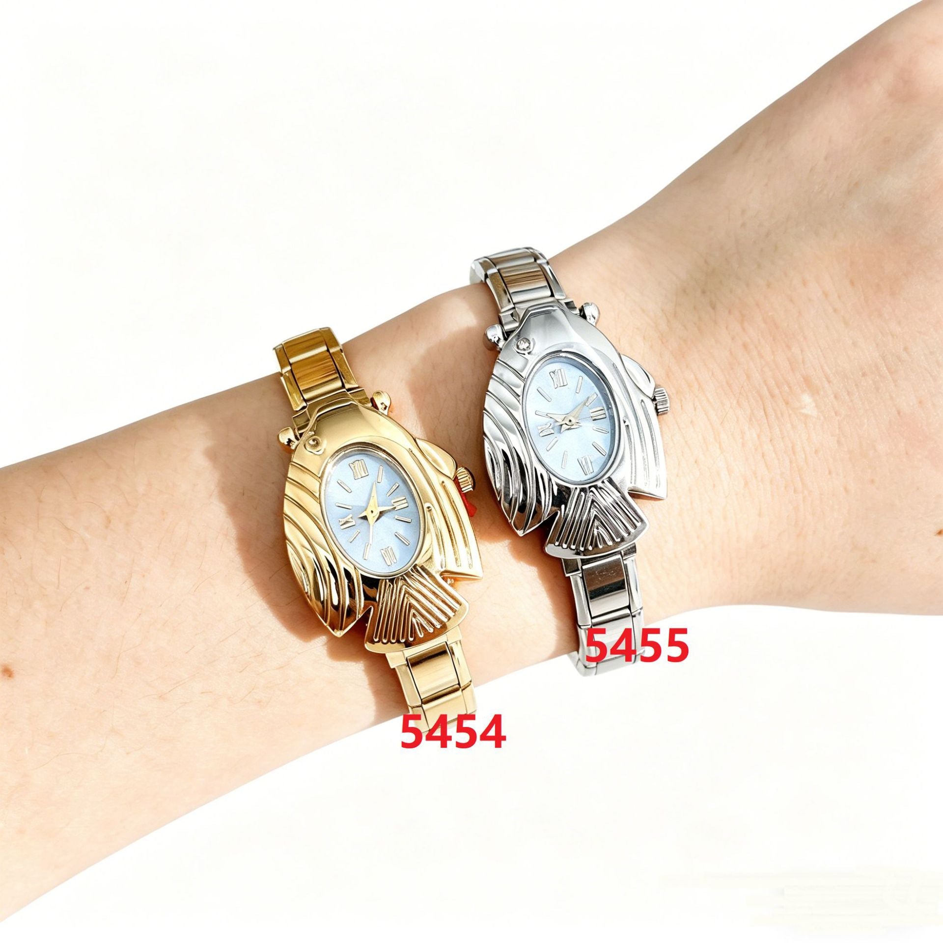 Wholesale Flying Fish Auspicious Simple Oval Quartz Wristwatch Couple Module Watch
