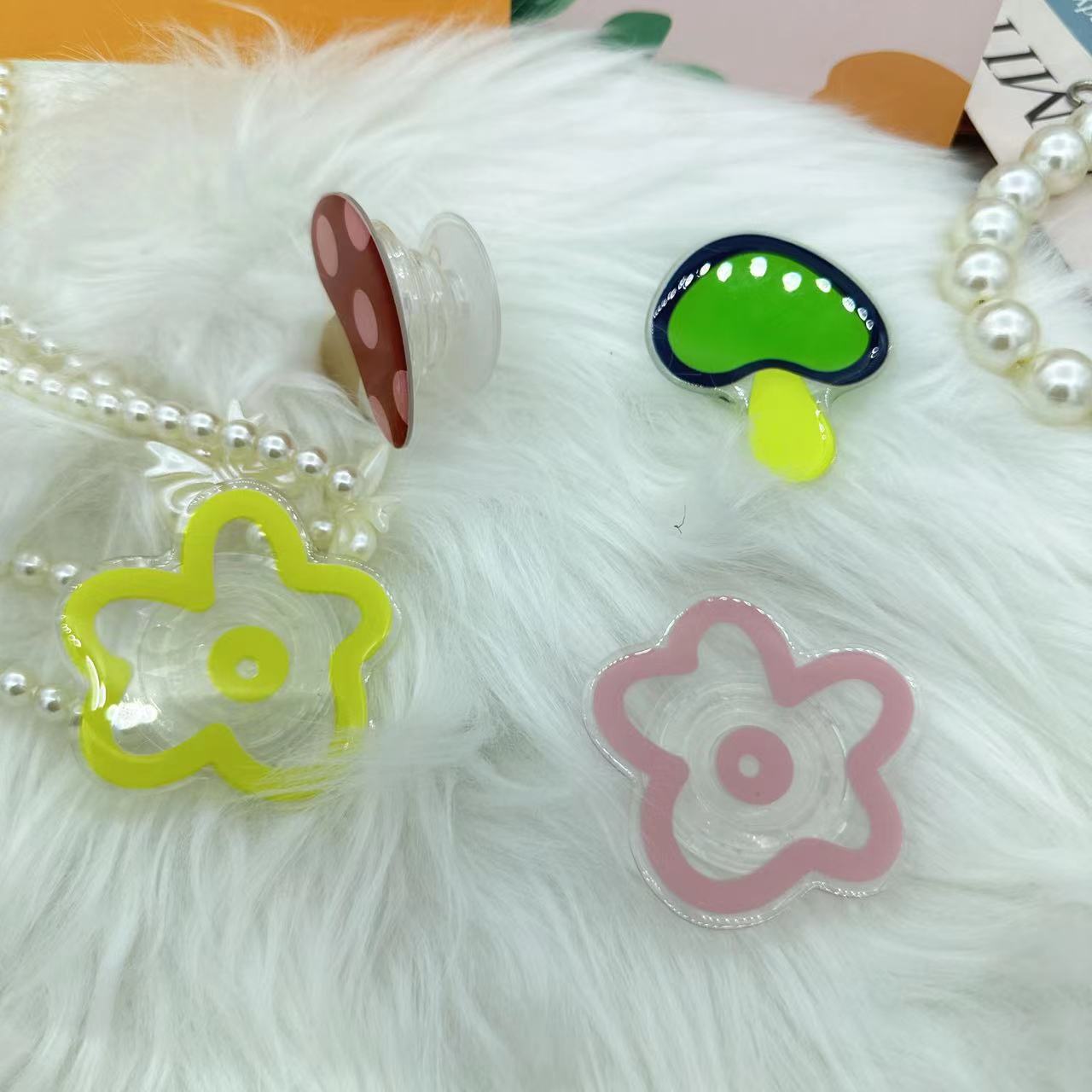 Wholesale Epoxy cartoon fun line flower phone  stand