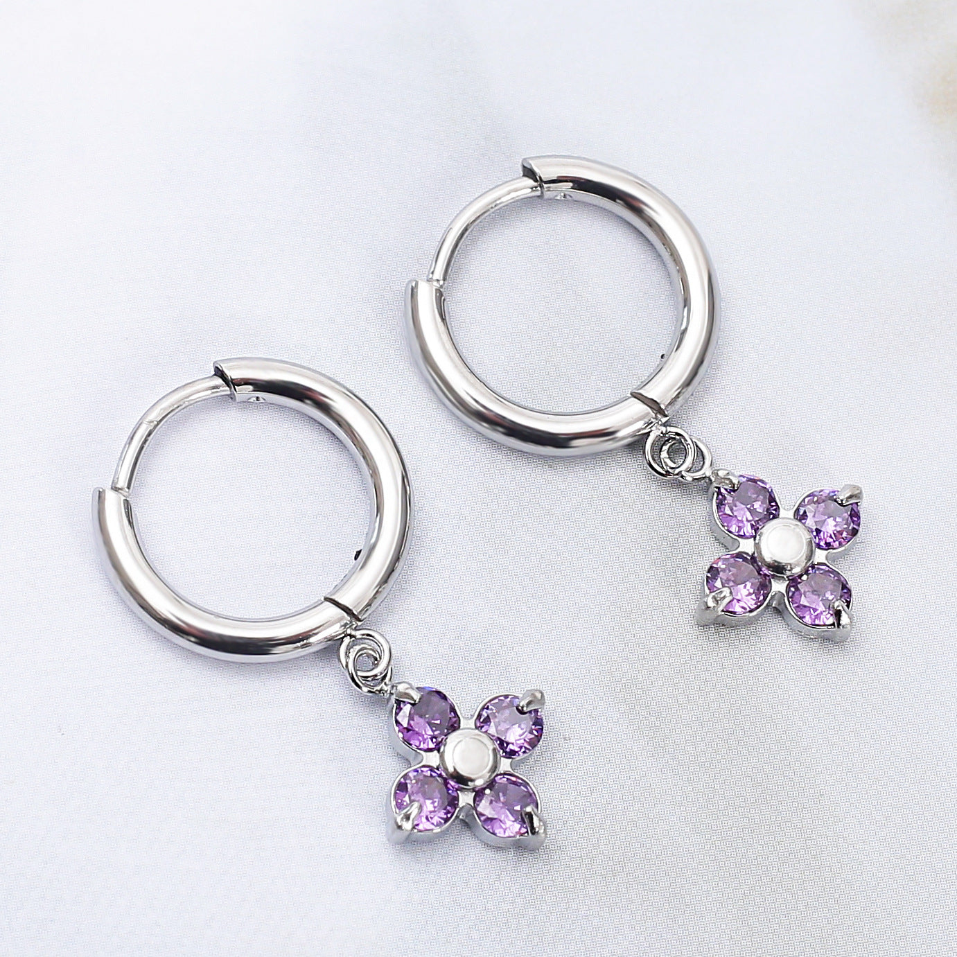 Wholesale Stainless steel flower earrings with zircon inlay