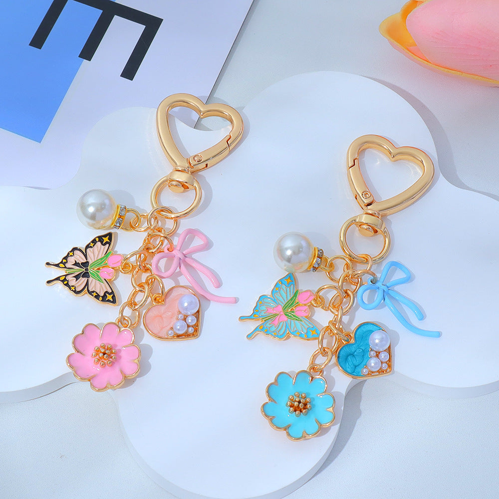 Wholesale Enamel Butterfly Flower Keychain with Pearl Pendant - Trendy Car Key Accessory