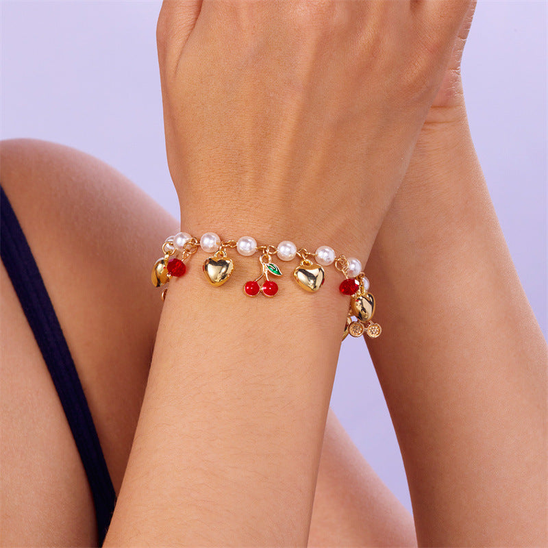 Wholesale Trendy Sweet Pearl Bracelet With Crystal Cherry Strawberry And Heart Charms Adjustable Fashion Jewelry Accessory For Women Boutique Resale And Gift