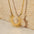 Wholesale Simple Sunflower 18K Titanium Steel Women's Short Necklace