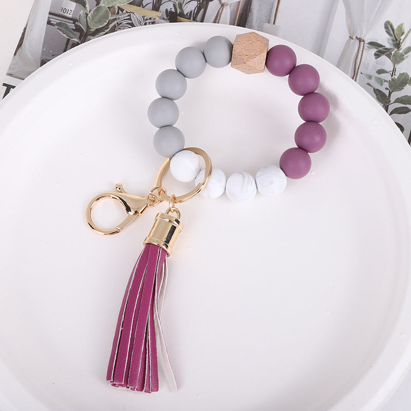 Wholesale Trendy Silicone Bead Bracelet With Tassel Wooden Bead Keychain Natural Geometry Style Chic Jewelry Accessory Gift