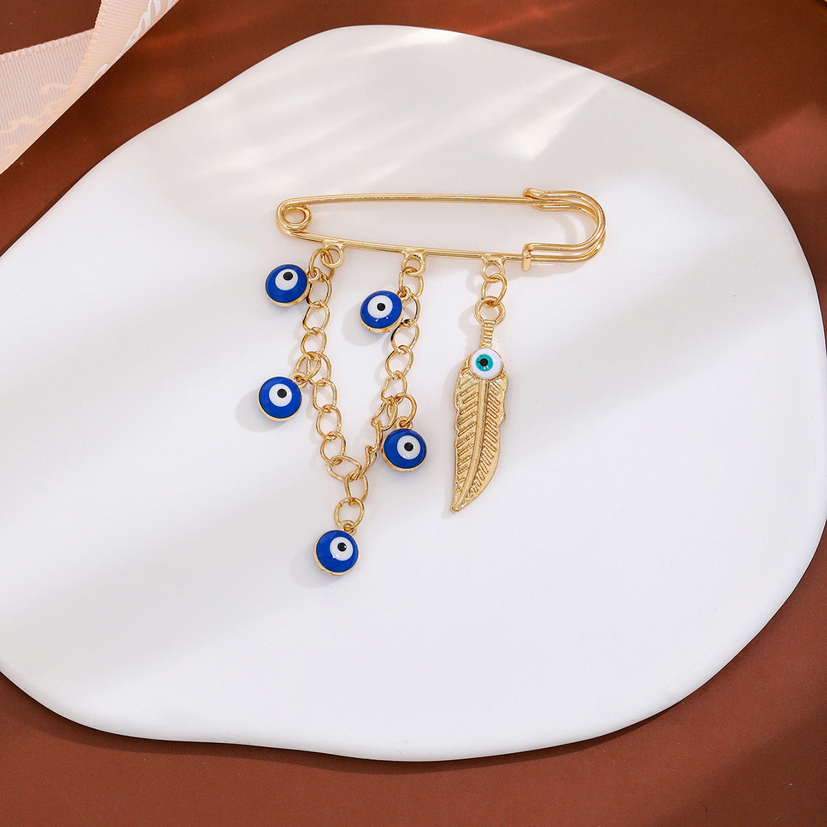 Wholesale Diamond-encrusted Devil' s Eye Tassel Brooch