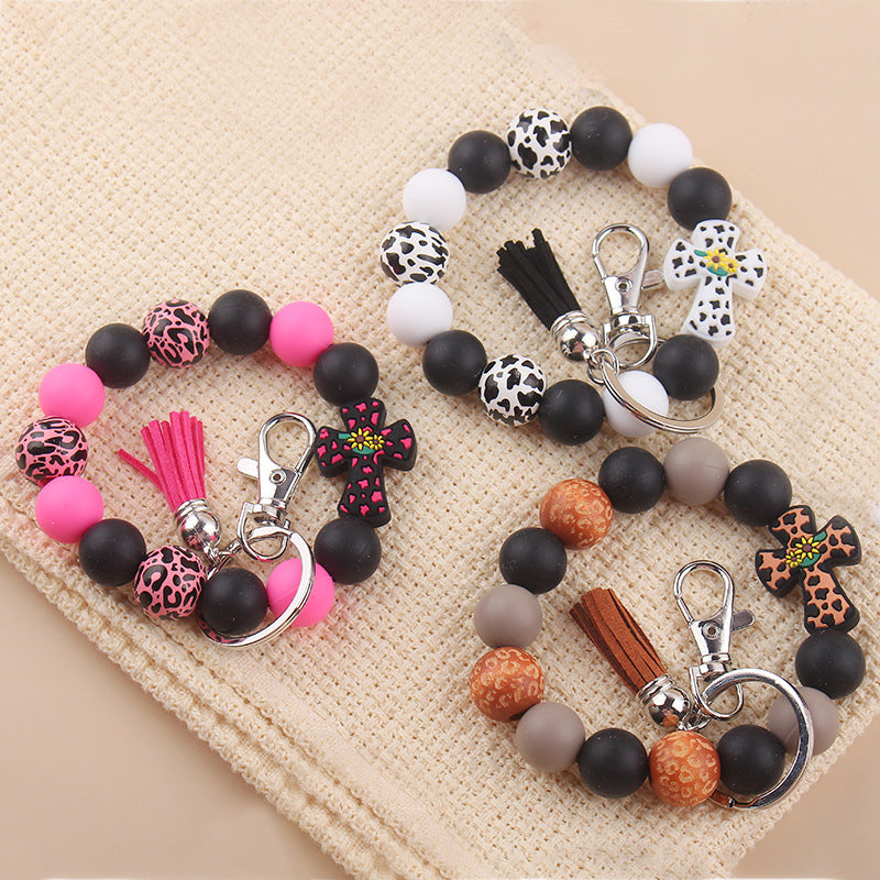 Wholesale New Silicone Beaded Keychain Pendant Leather Small Tassel Print Leopard Print Wooden Bead Bracelet Keychain Accessories ACC-KC-GuangTian036