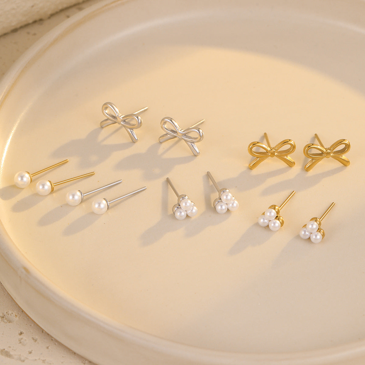 Wholesale light luxury  bow pearl stainless steel earrings