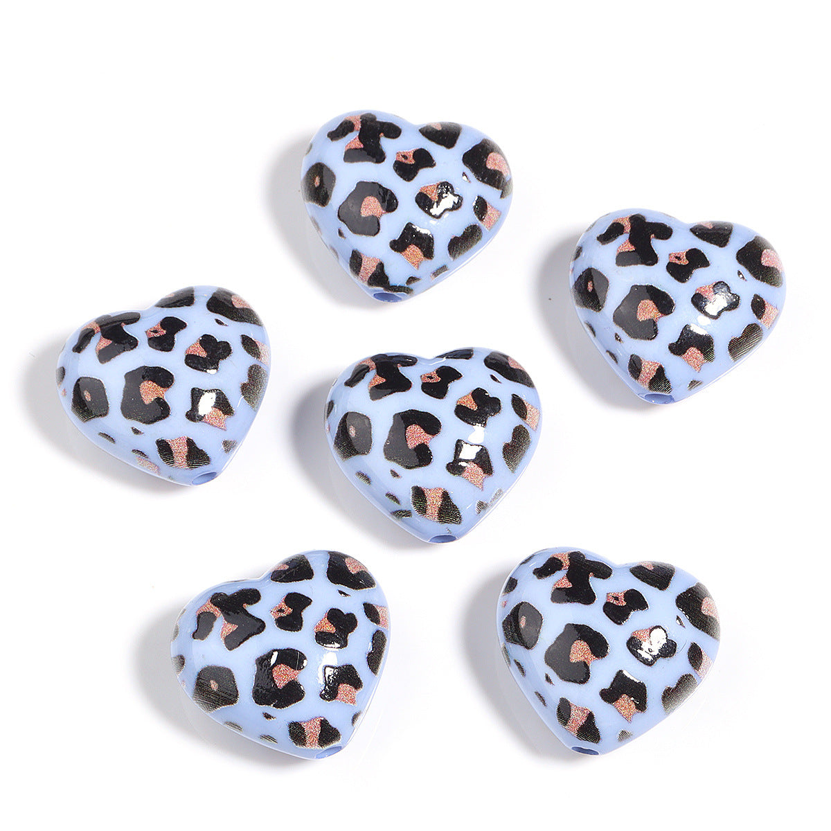 Wholesale 5pcs Acrylic Beads of colorful leopard print heart-shaped acrylic beads for DIY crafts.