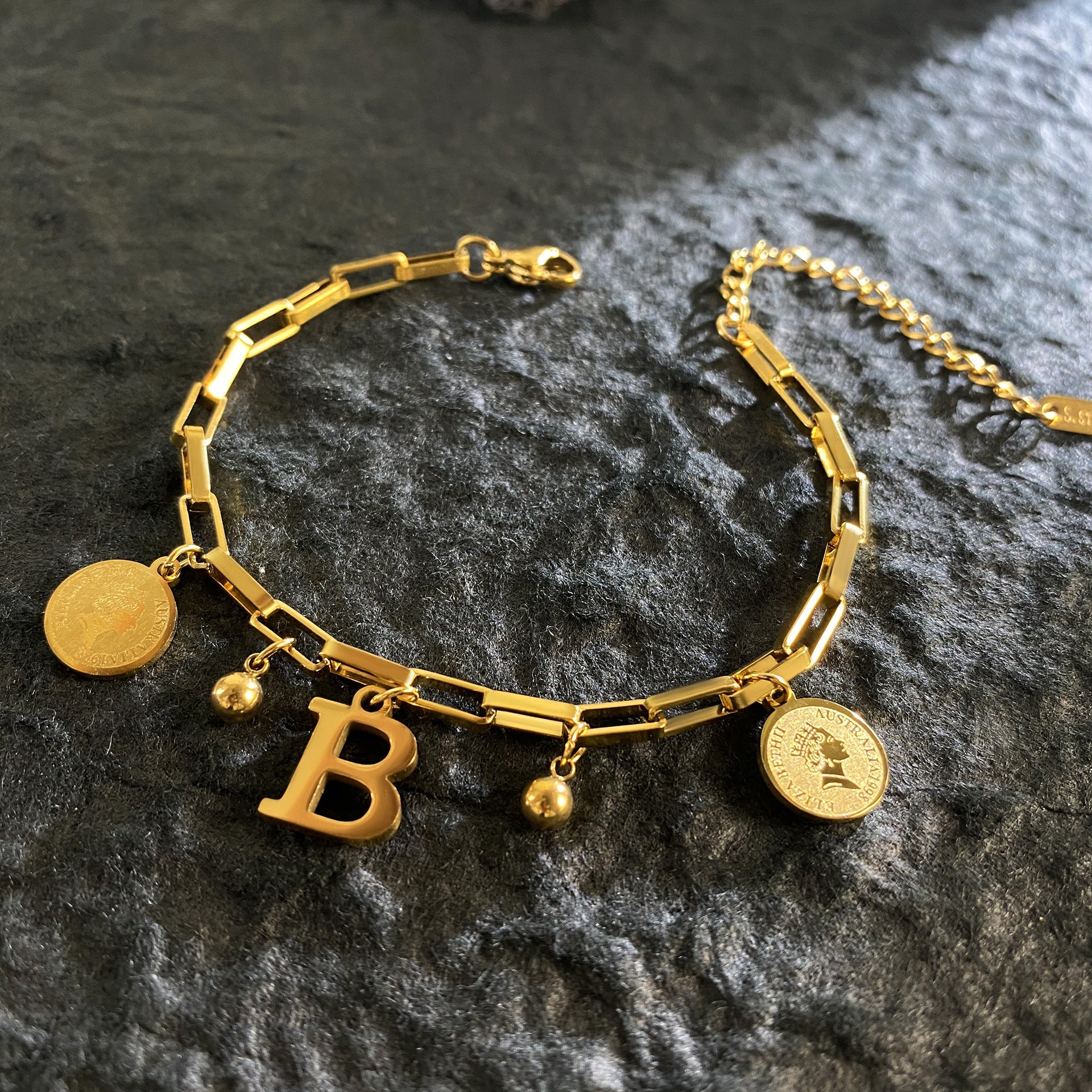 Wholesale Titanium Steel 18K Gold Plated Queen's Head Letter Bracelet ACC-BT-YuXun007