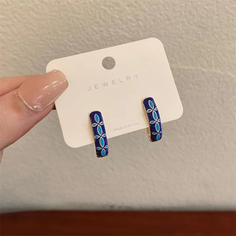 Wholesale Vintage Palace Oil Drop Blue Petal Earrings