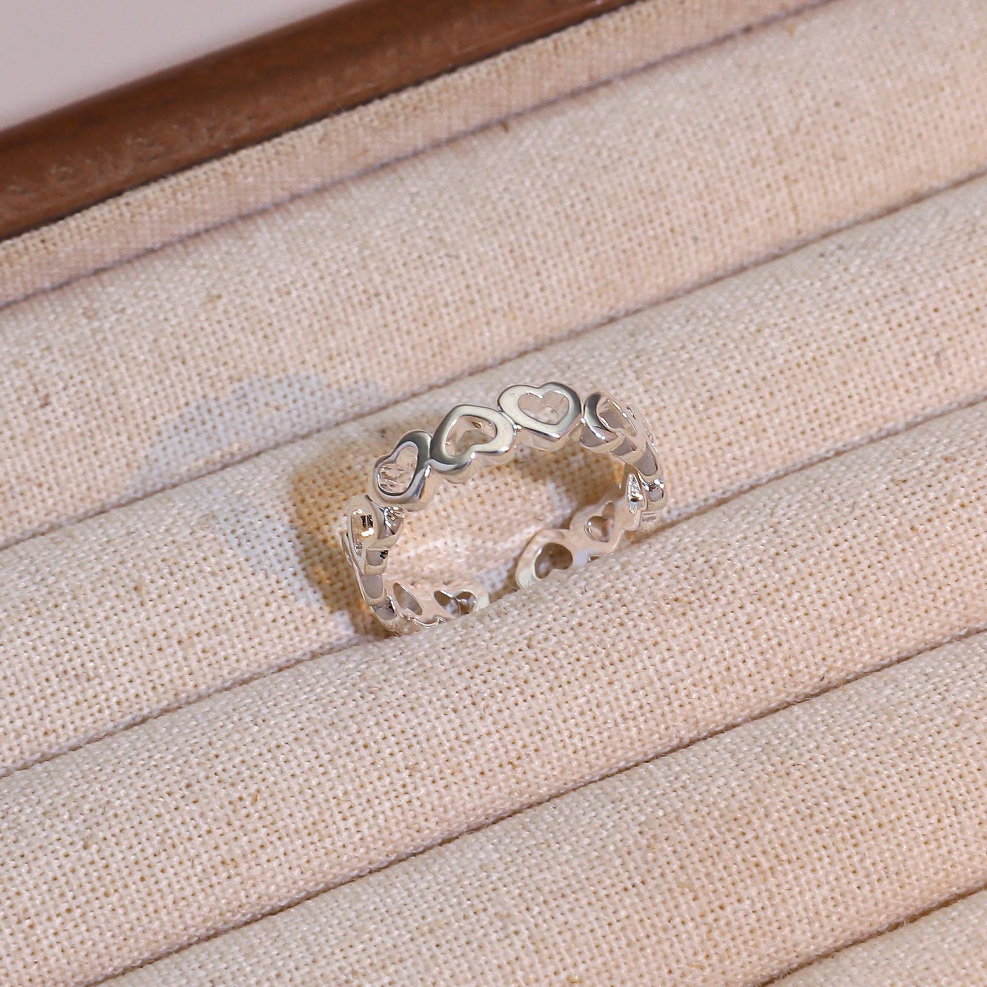 Wholesale Hollow heart knotted double-headed snake snowflake plum blossom opening adjustable ring five-piece set