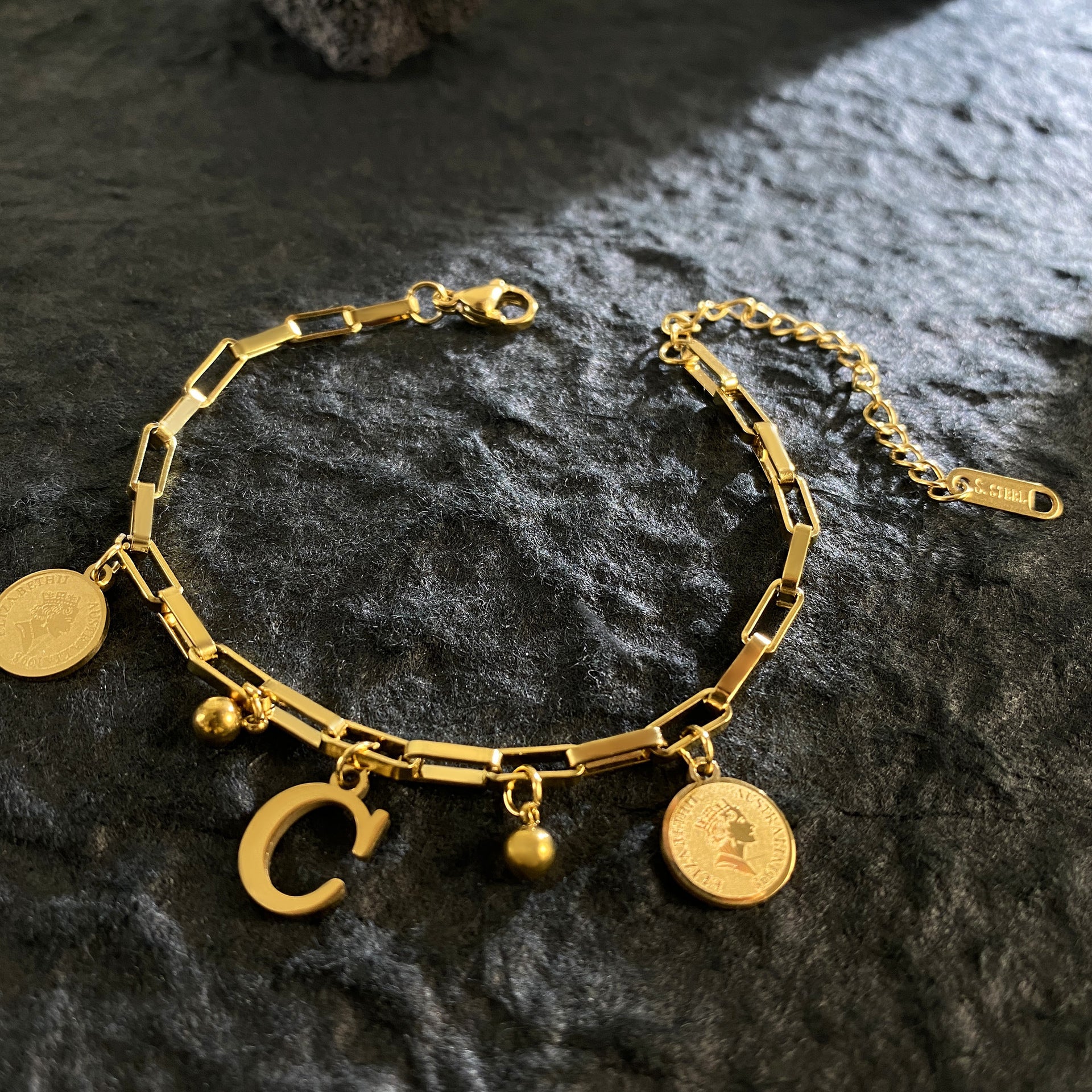 Wholesale Titanium Steel 18K Gold Plated Queen's Head Letter Bracelet ACC-BT-YuXun007