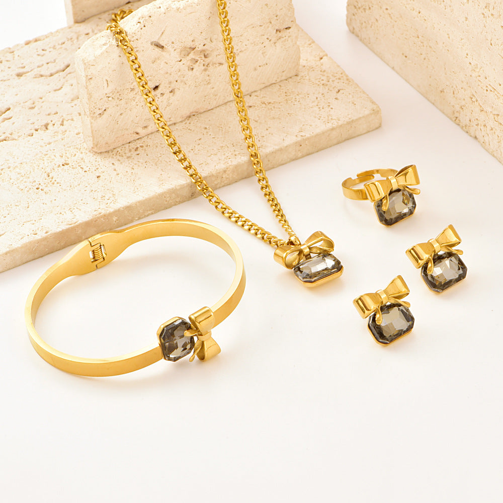 Wholesale Stainless Steel Bow Rhinestone Necklace,  Bracelet,  Earrings,  and Ring Set
