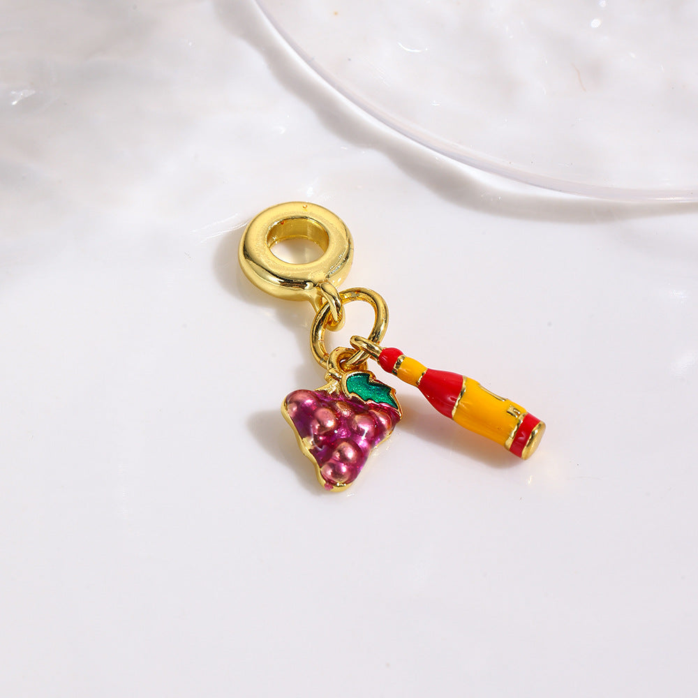 Wholesale Copper oil drop grape cola suitcase camera earphone three-piece pendant set