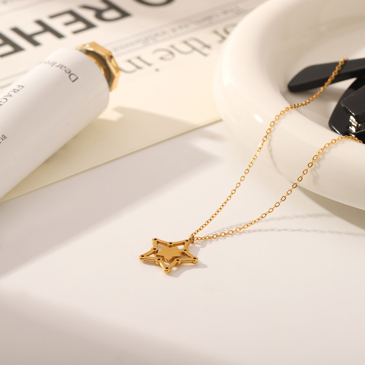 Wholesale diamond hollow five-pointed star titanium steel necklace