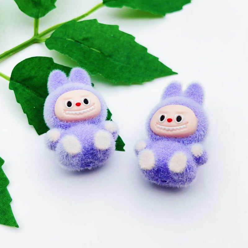 Wholesale 10pcs cartoon flocking sitting doll with beads