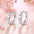 Wholesale heart inlaid zircon earrings