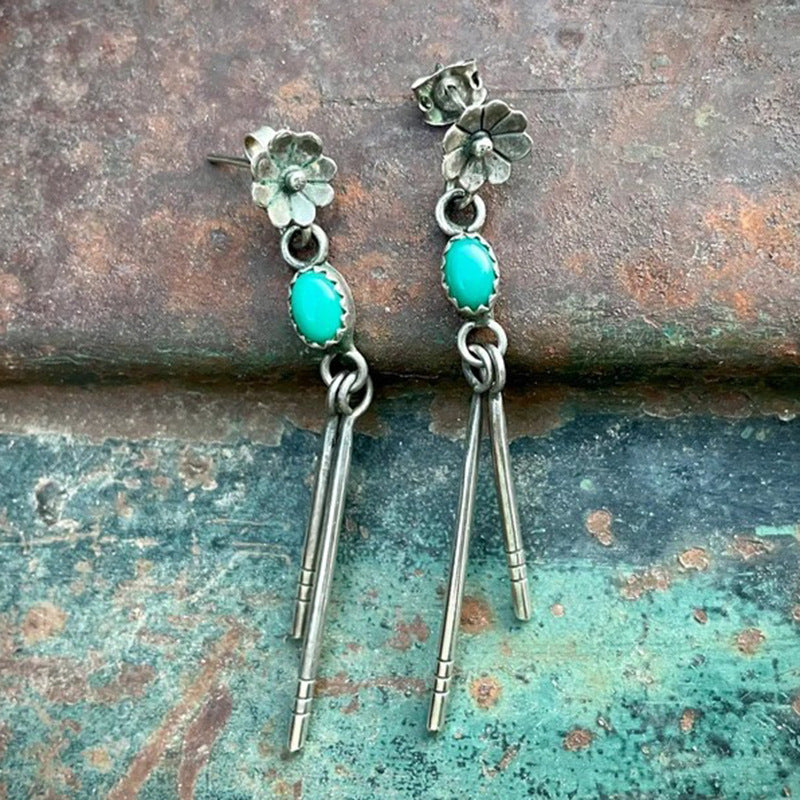 Wholesale Bohemian style carved pine stone long earrings