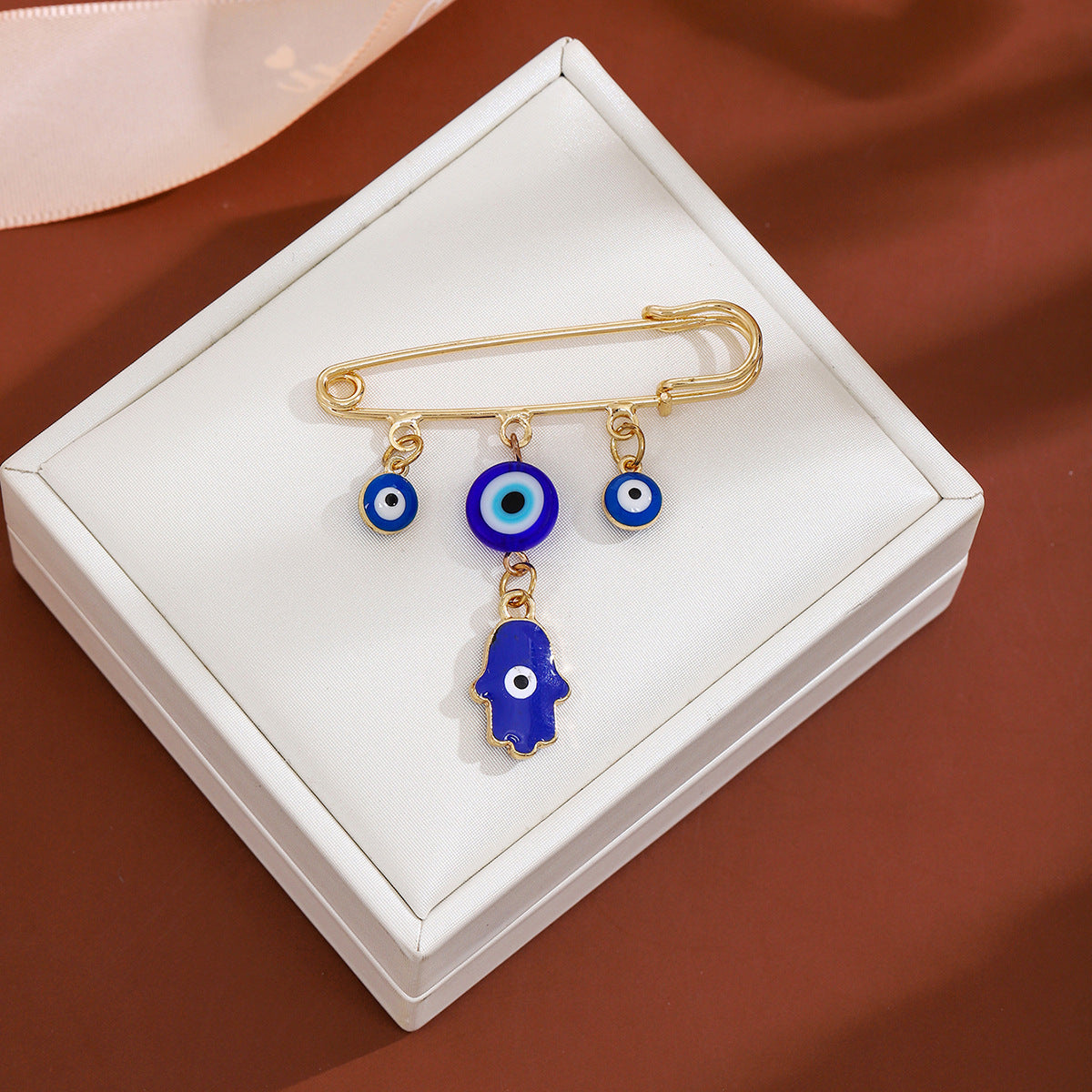 Wholesale Diamond-encrusted Devil' s Eye Tassel Brooch