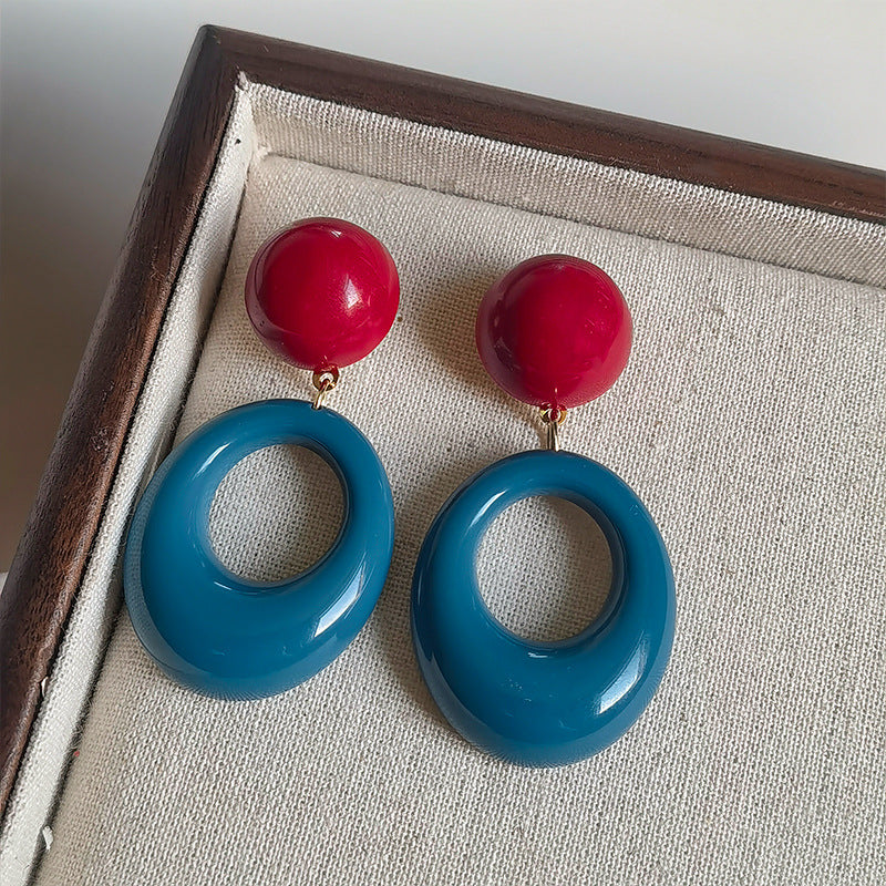 Wholesale exaggerated blue and red ear clips