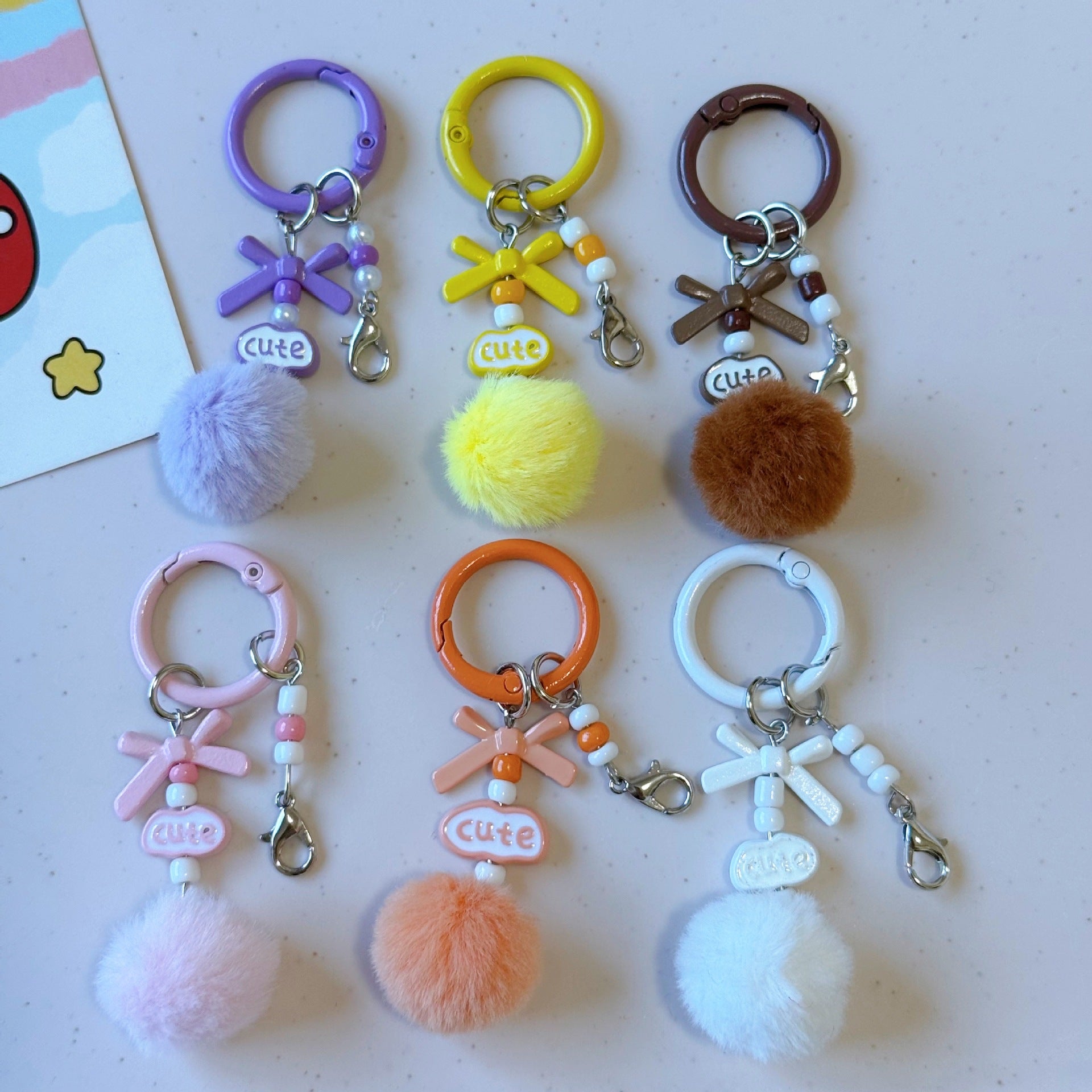 Wholesale Stylish DIY Cute Keychain Craft Kit Metal Lobster Clasps Beads Pom Poms Bows For Bag Charm Car Key Accessory Boutique Resale