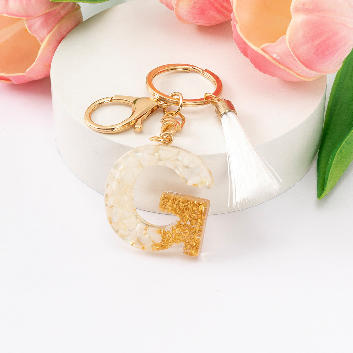 Wholesale Gold Foil New Resin Crystal Glue White Tassel Color English Digital Keychain