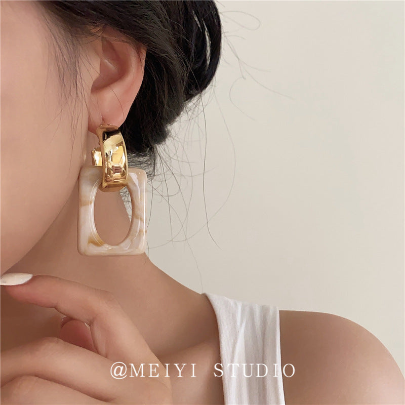 Wholesale retro hollow geometric acrylic silver needle light luxury earrings