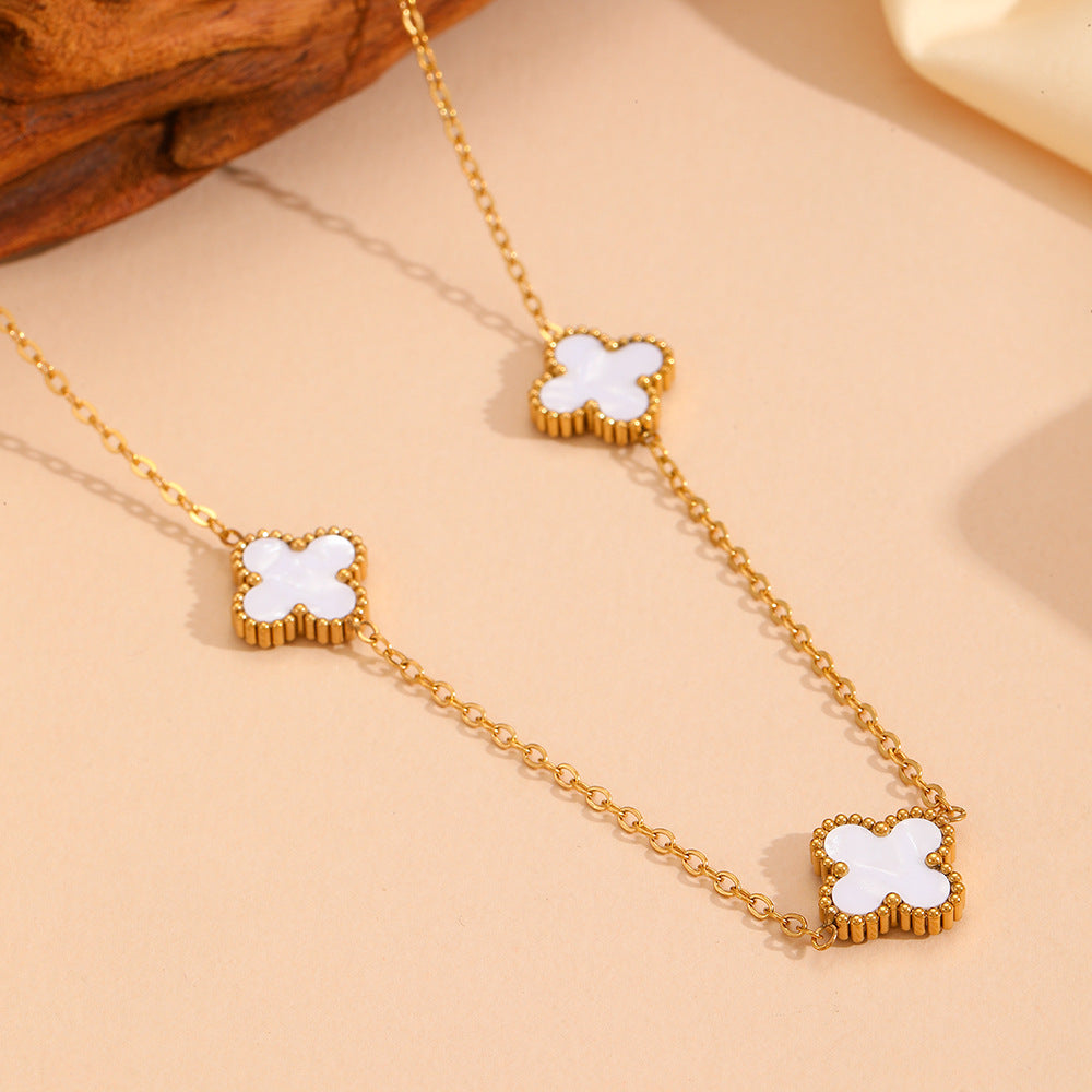 Wholesale Fashion stainless steel three four-leaf flower jewelry new titanium steel does not fade small flower jewelry suit