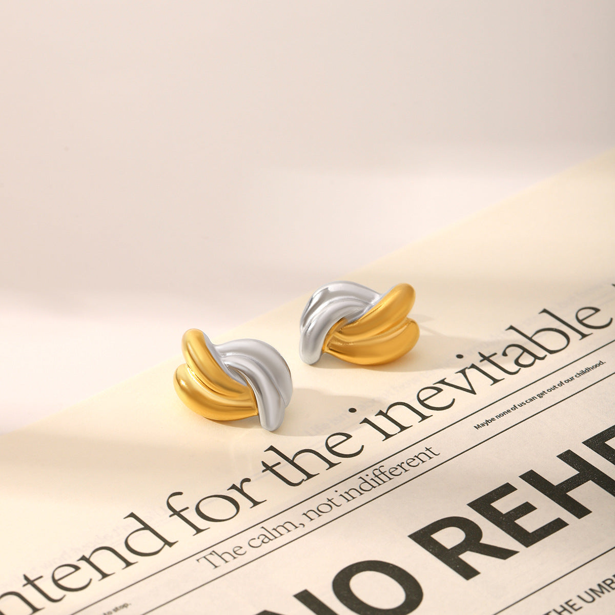 Wholesale  gold and silver color matching geometric twist-shaped stainless steel gold-plated earrings