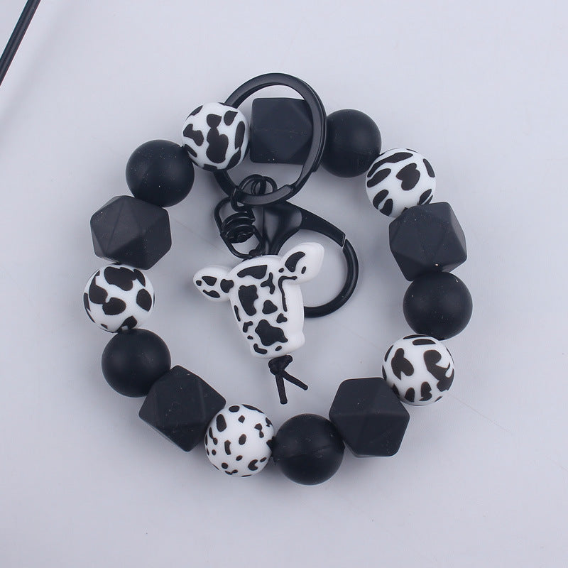 Wholesale Cartoon Bull Head Aztec Cross Silicone Beaded Wrist Keychain