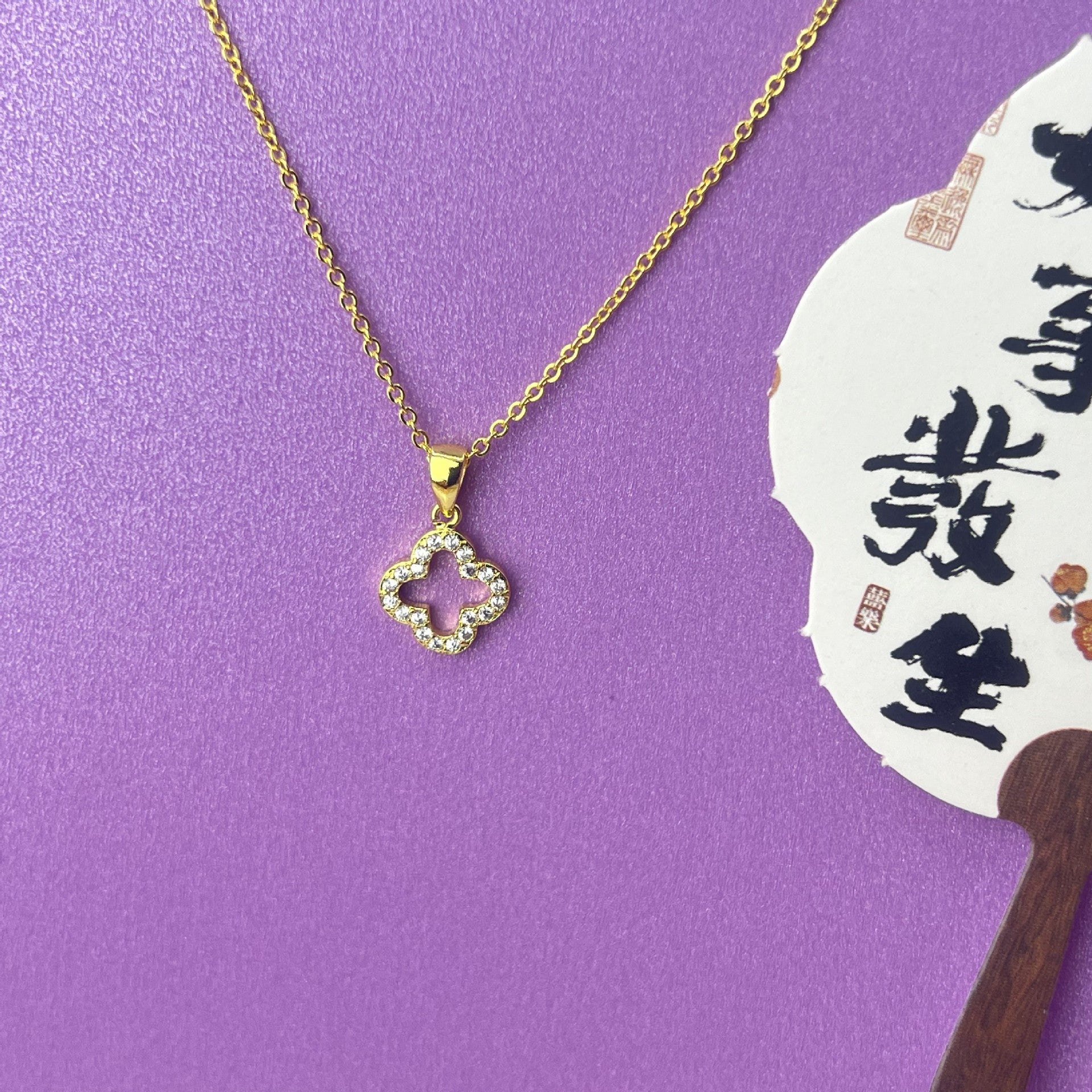 Wholesale Trendy Four Leaf Clover Hollow Pendant Necklace Gold Plated Copper Party Fashion Accessory For Women Boutique Resale