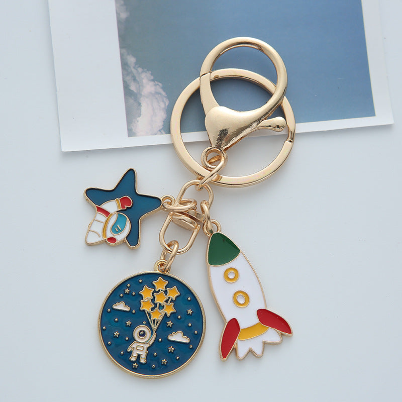Wholesale Cartoon Planet Astronaut Keychain
