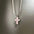 Wholesale Titanium Steel Pink Shell Cross Necklace