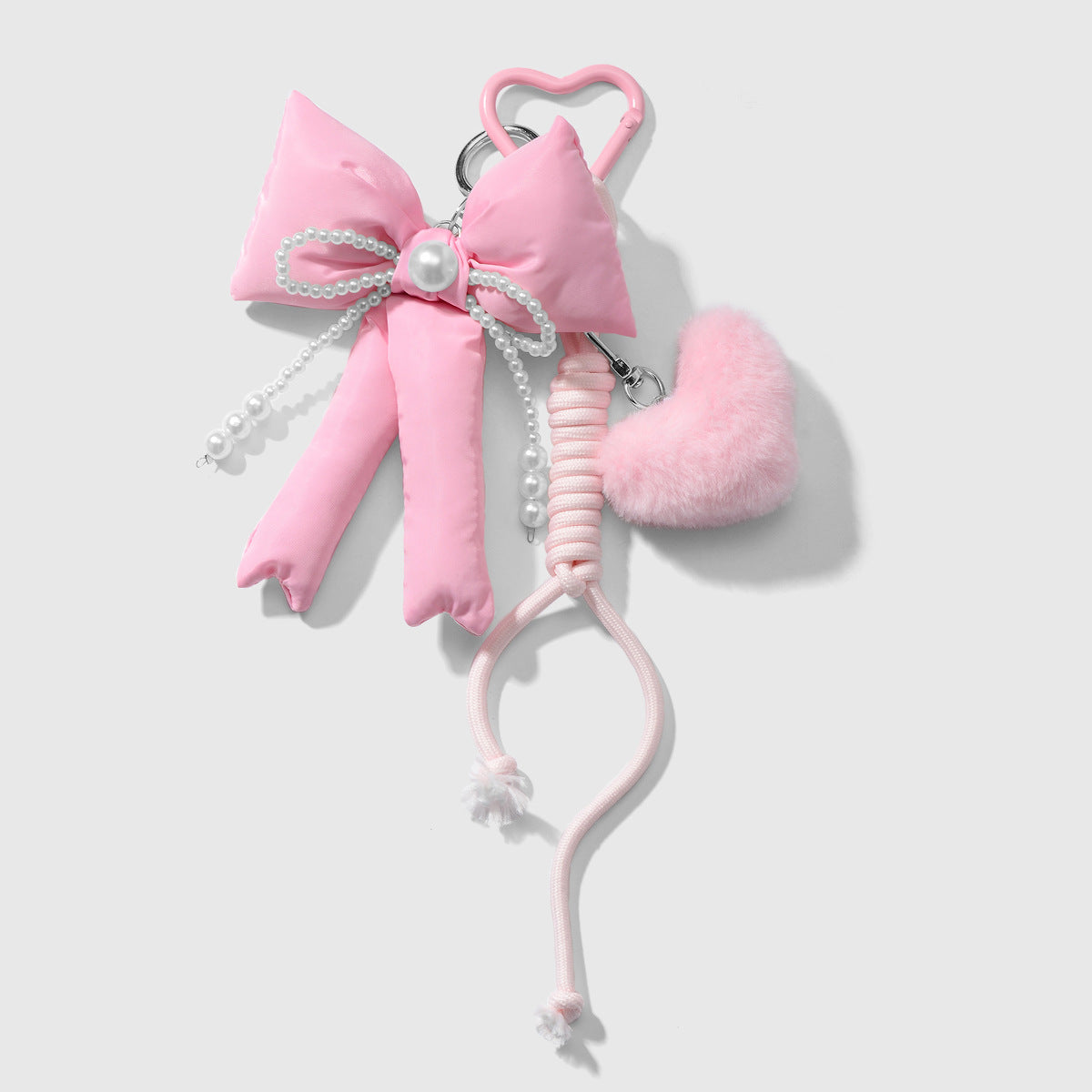 Wholesale Zinc alloy pink twistable stick bowknot and heart-shaped keychain