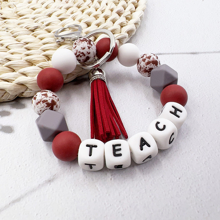 Wholesale Black And White Alphabet Bead Tassel Keychain Bag Charm For Teacher S Day Gift