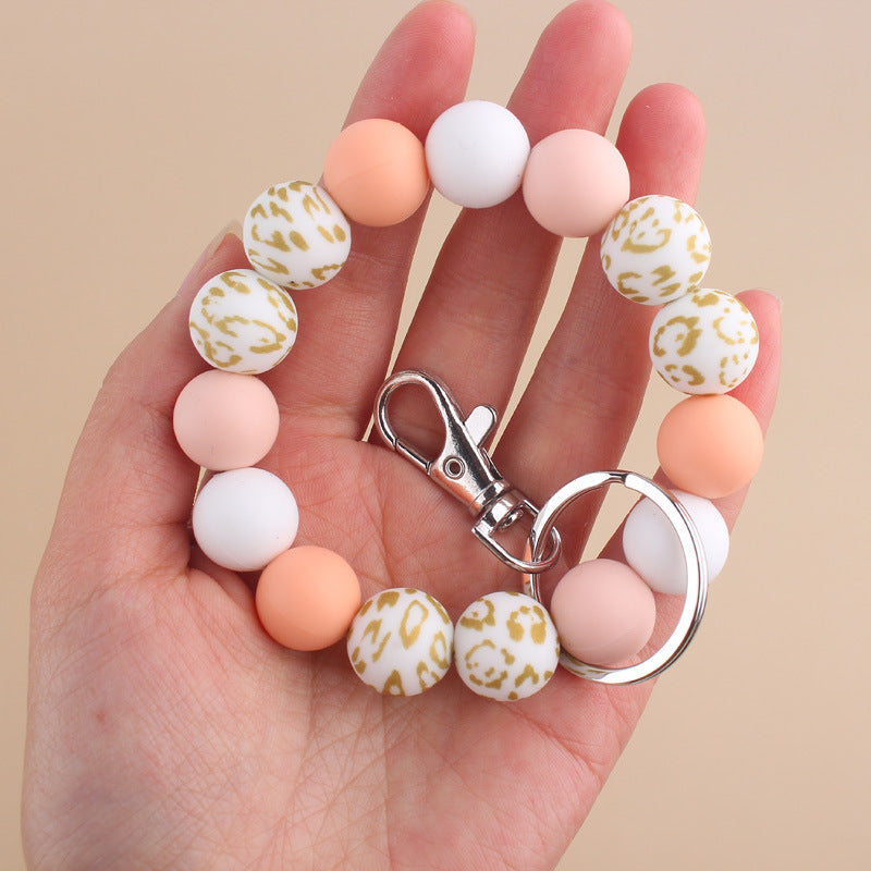 Wholesale Cow Pattern Sunflower Pattern Silicone Beaded Wrist Keychain ACC-KC-GuangTian024