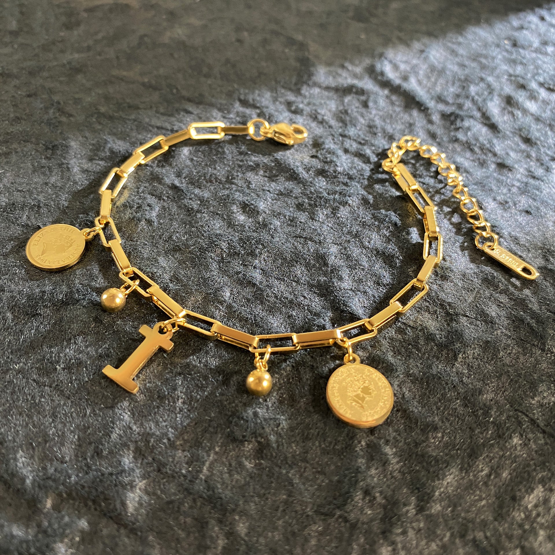 Wholesale Titanium Steel 18K Gold Plated Queen's Head Letter Bracelet ACC-BT-YuXun007