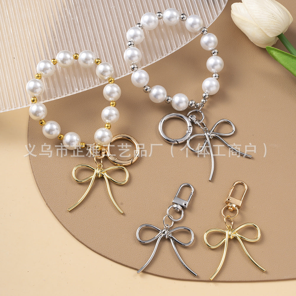 Wholesale Luxurious Resin Alloy Pearl Bow Keychains