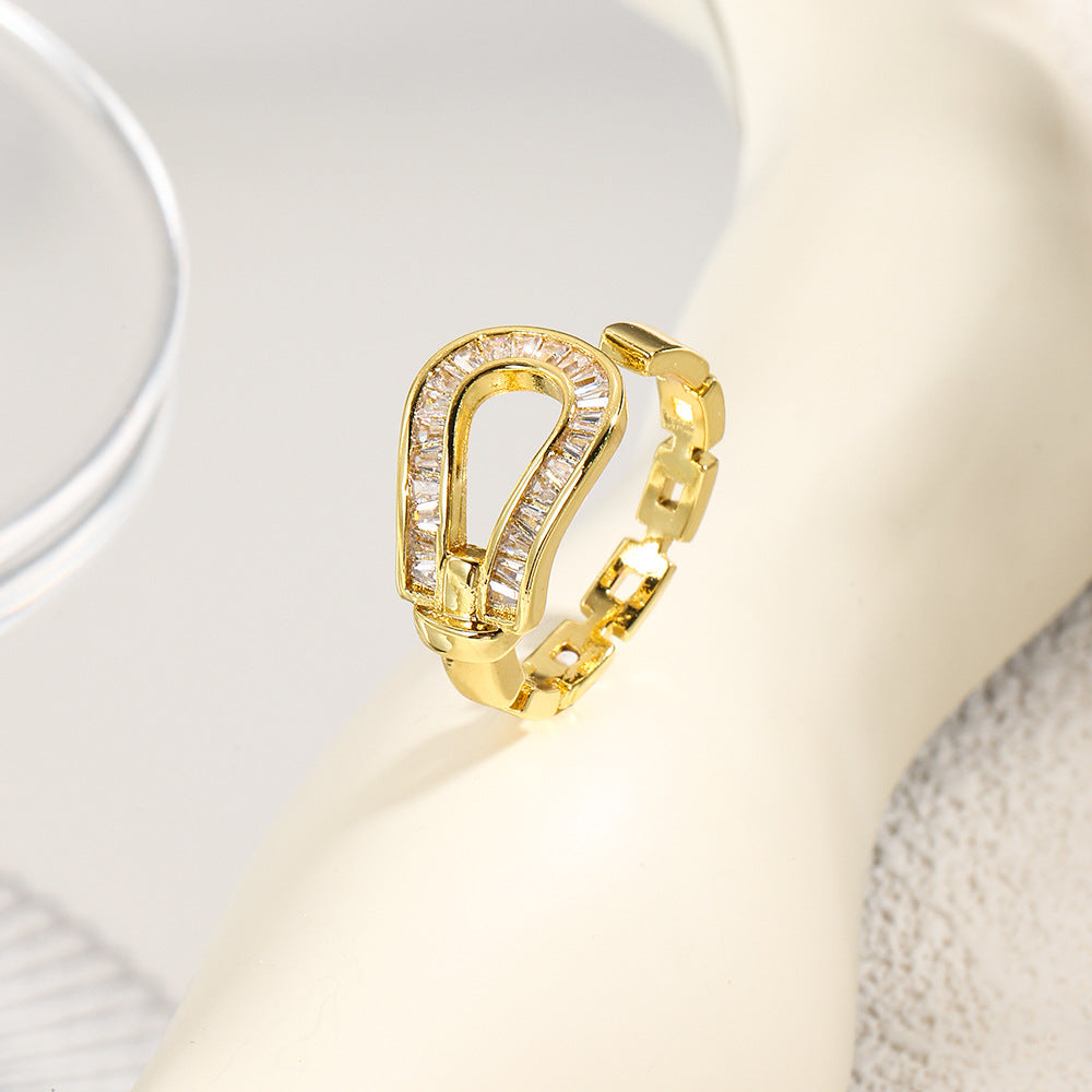 Wholesale Hollow inlaid stepped zircon horseshoe ring