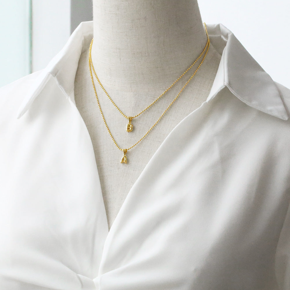 Wholesale 26 letters copper plated gold shiny necklace