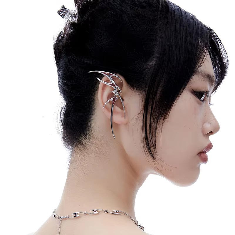 Wholesale Red Thorn Devil's Eye Alien Ear Clip Earrings