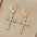 Wholesale light luxury cross earrings