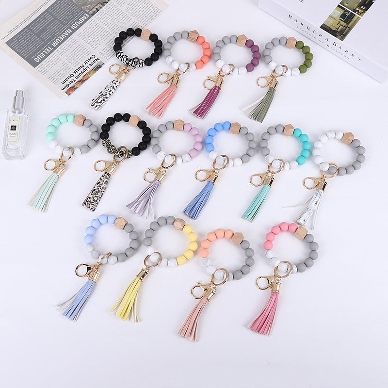 Wholesale Trendy Silicone Bead Bracelet With Tassel Wooden Bead Keychain Natural Geometry Style Chic Jewelry Accessory Gift