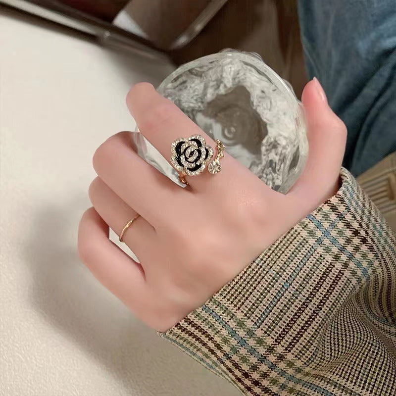 Wholesale Black camellia ring light luxury ring