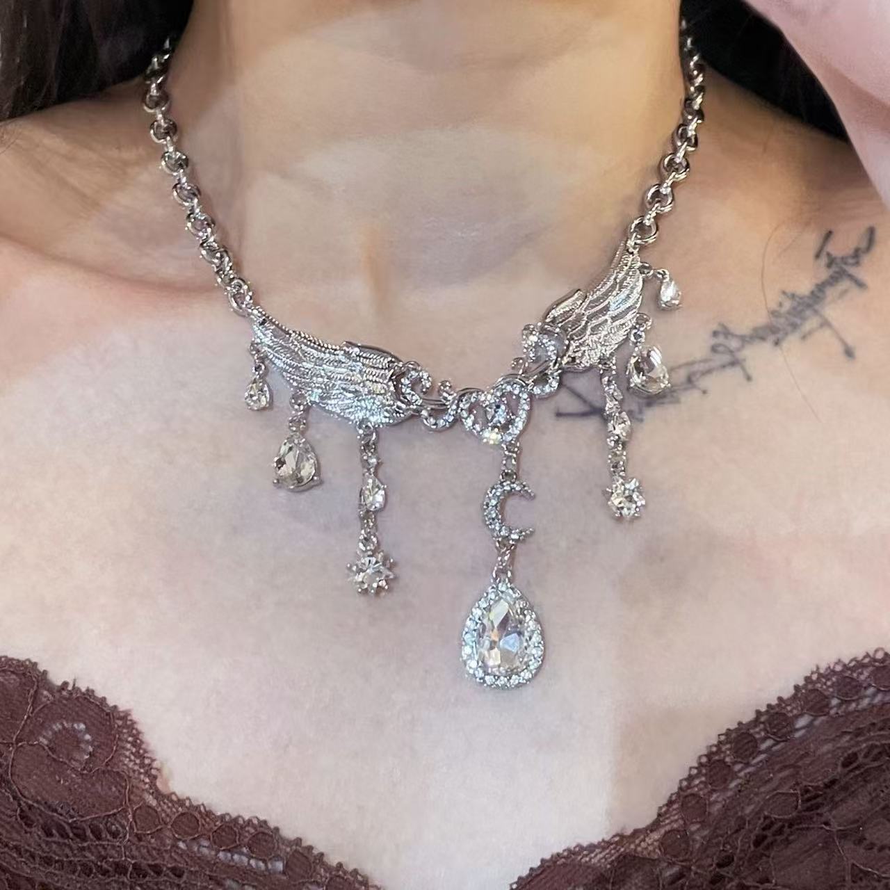 Wholesale Trendy Butterfly Star Moon Water Drop Tassel Necklace,  Silver Tone Chain,  Fashion Accessory for Boutique Resale