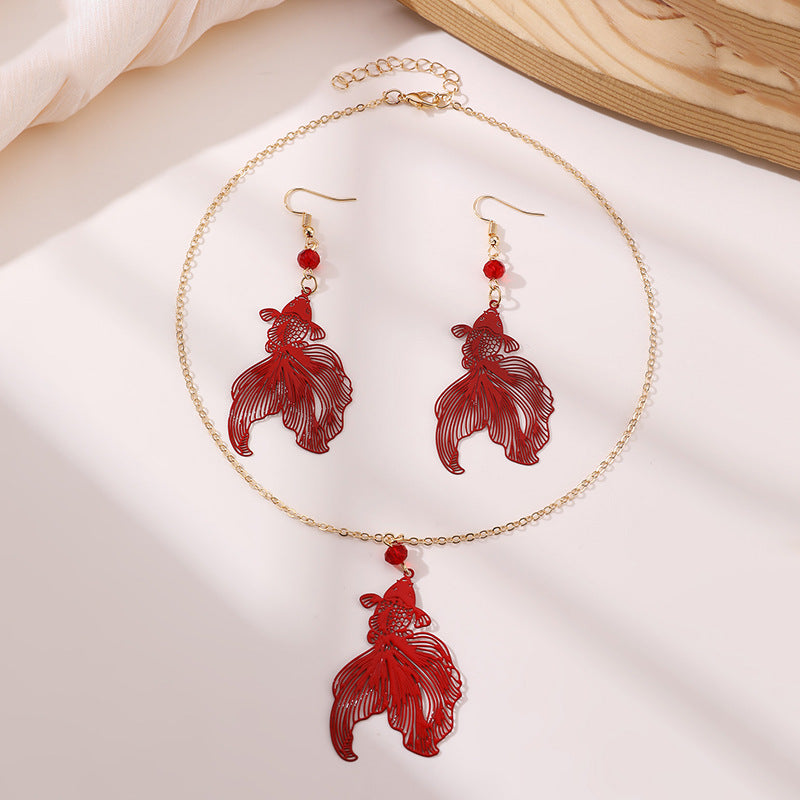 Wholesale  Retro Ball Hollow Goldfish  Design Earrings